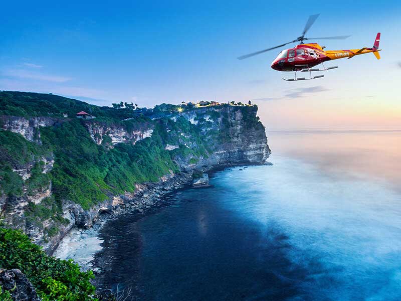 cliff in Bali with a beautiful view. Consider site seeing in Uluwatu for beautiful views on your one week Bali itinerary! 